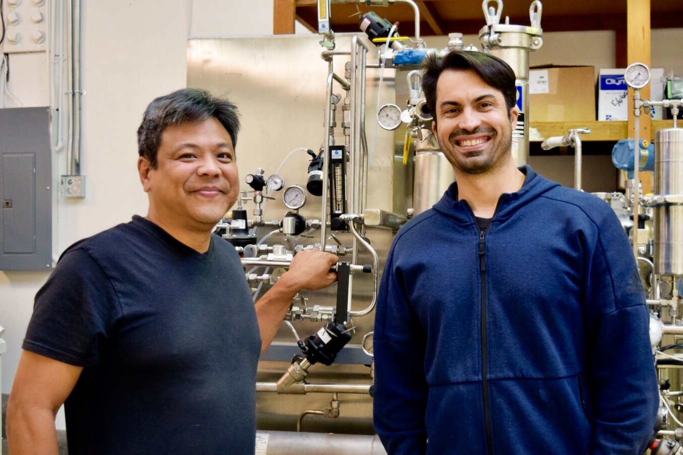 Wild earth team dr.  ron shigeta & ryan bethencourt smiling in their research facility | source: wild earth