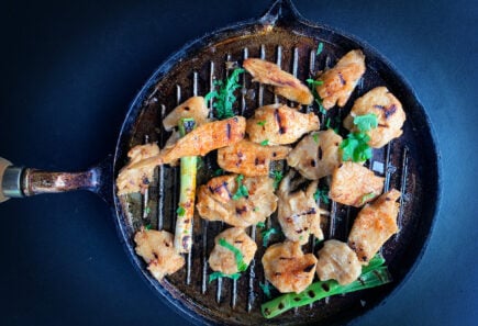 Plant-based chicken in a skillet top down view