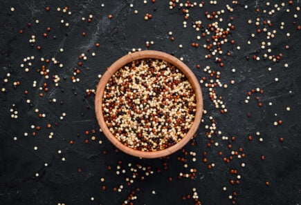 Red, white, and brown quinoa in a bowl